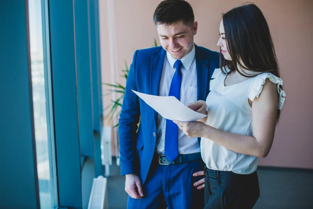 HR professionals reviewing staffing requirements to support flexible contract staffing solutions